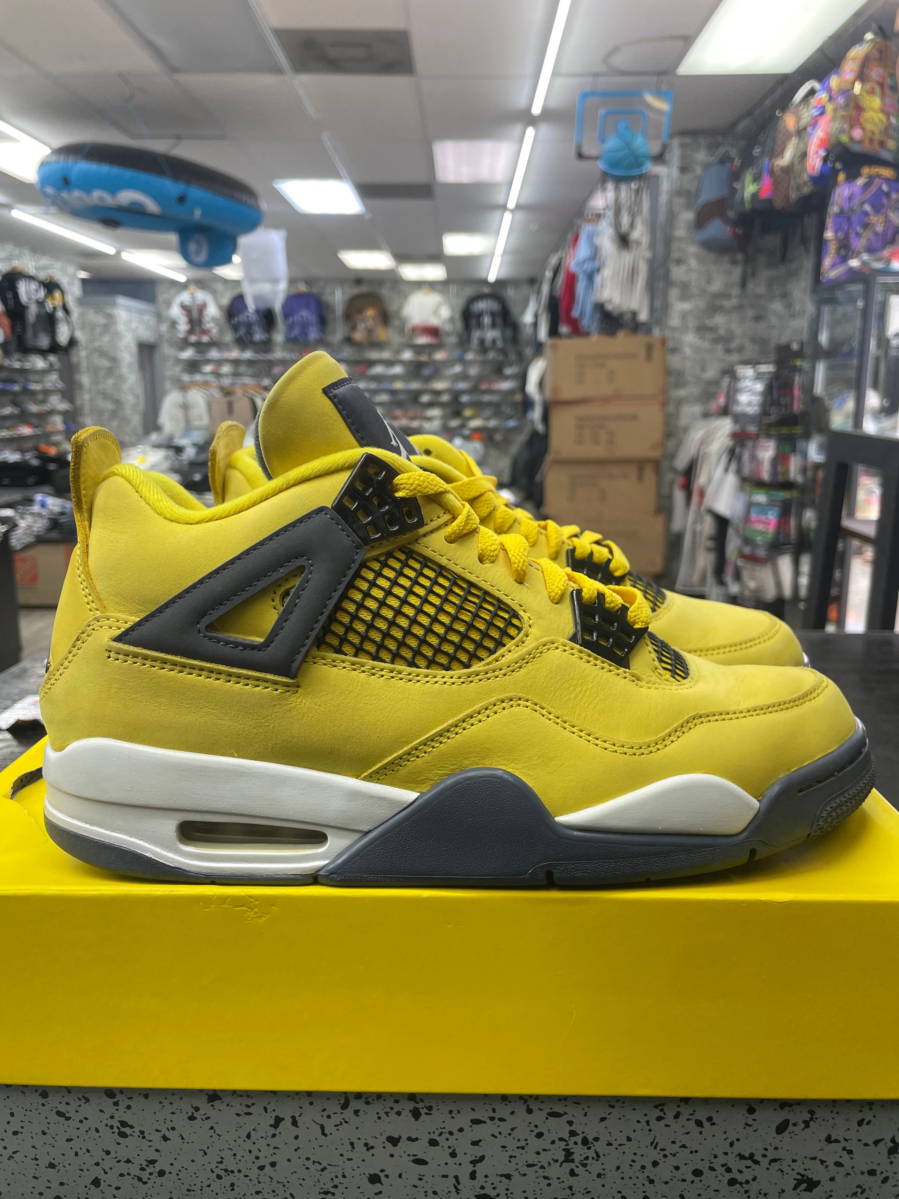 Air Jordan Retro 4 “Lighting” *Size 9 Preowned* (CT8527-700)
