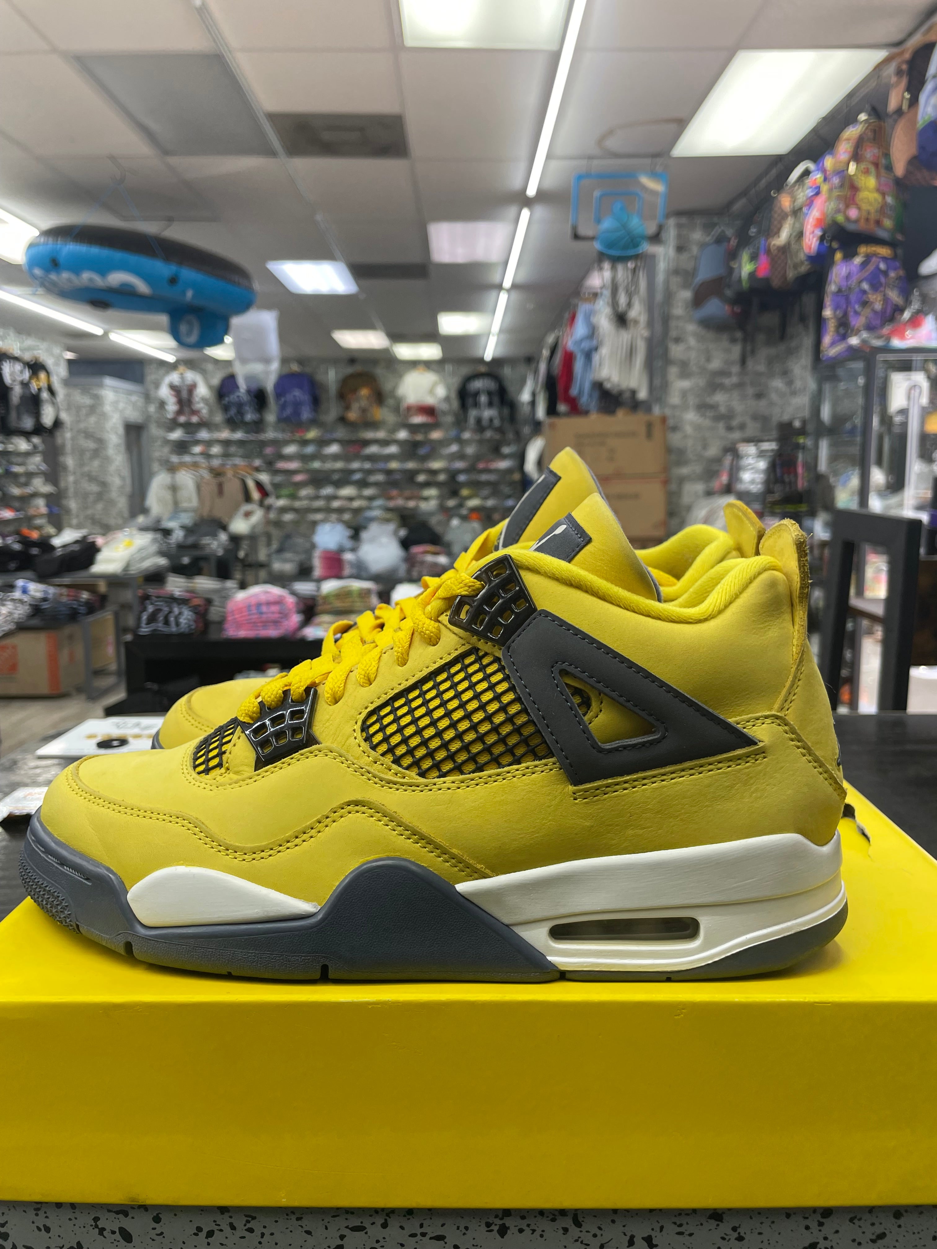 Air Jordan Retro 4 “Lighting” *Size 9 Preowned* (CT8527-700)