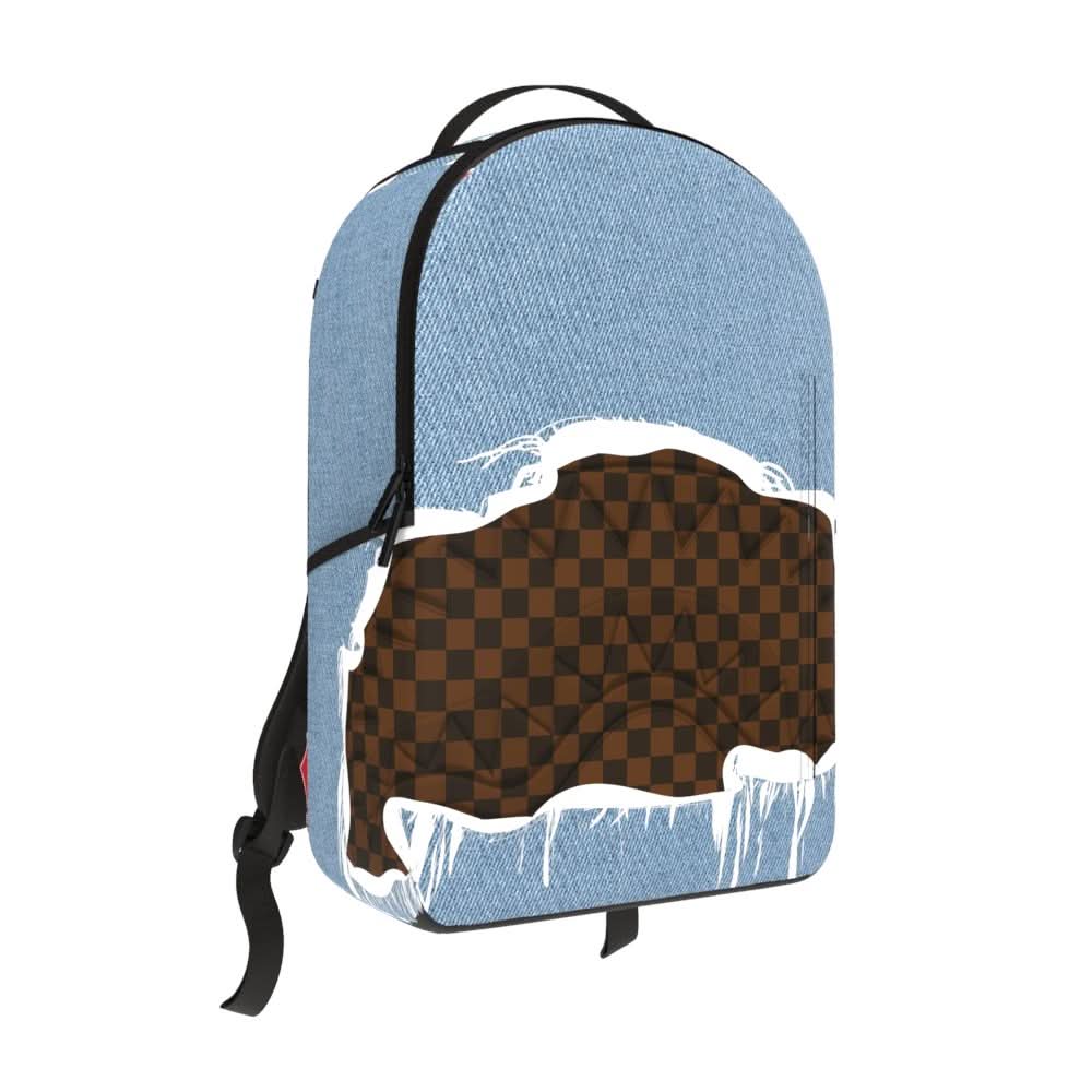 Sprayground “DENIM SHARK BITE DLXSV BACKPACK"