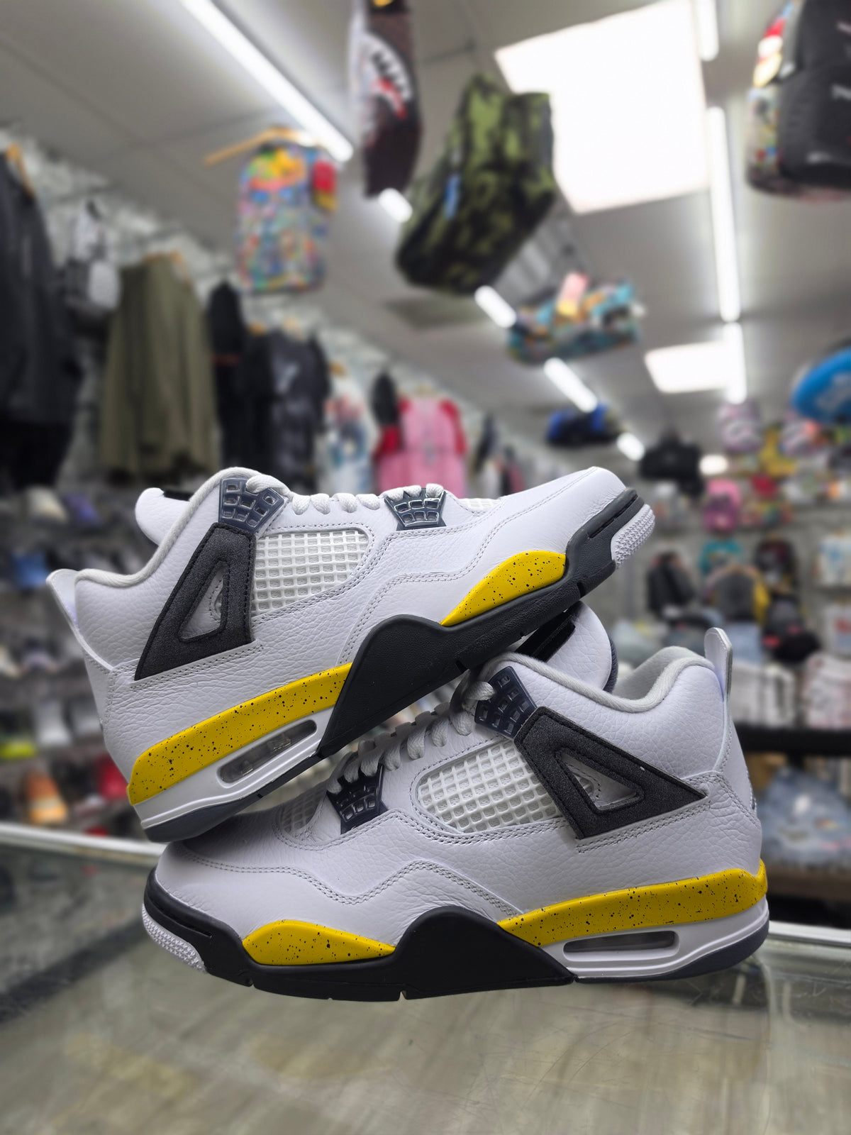 Air Jordan Retro 4 "Rare Air" TOUR/YELLOW IO2463-102