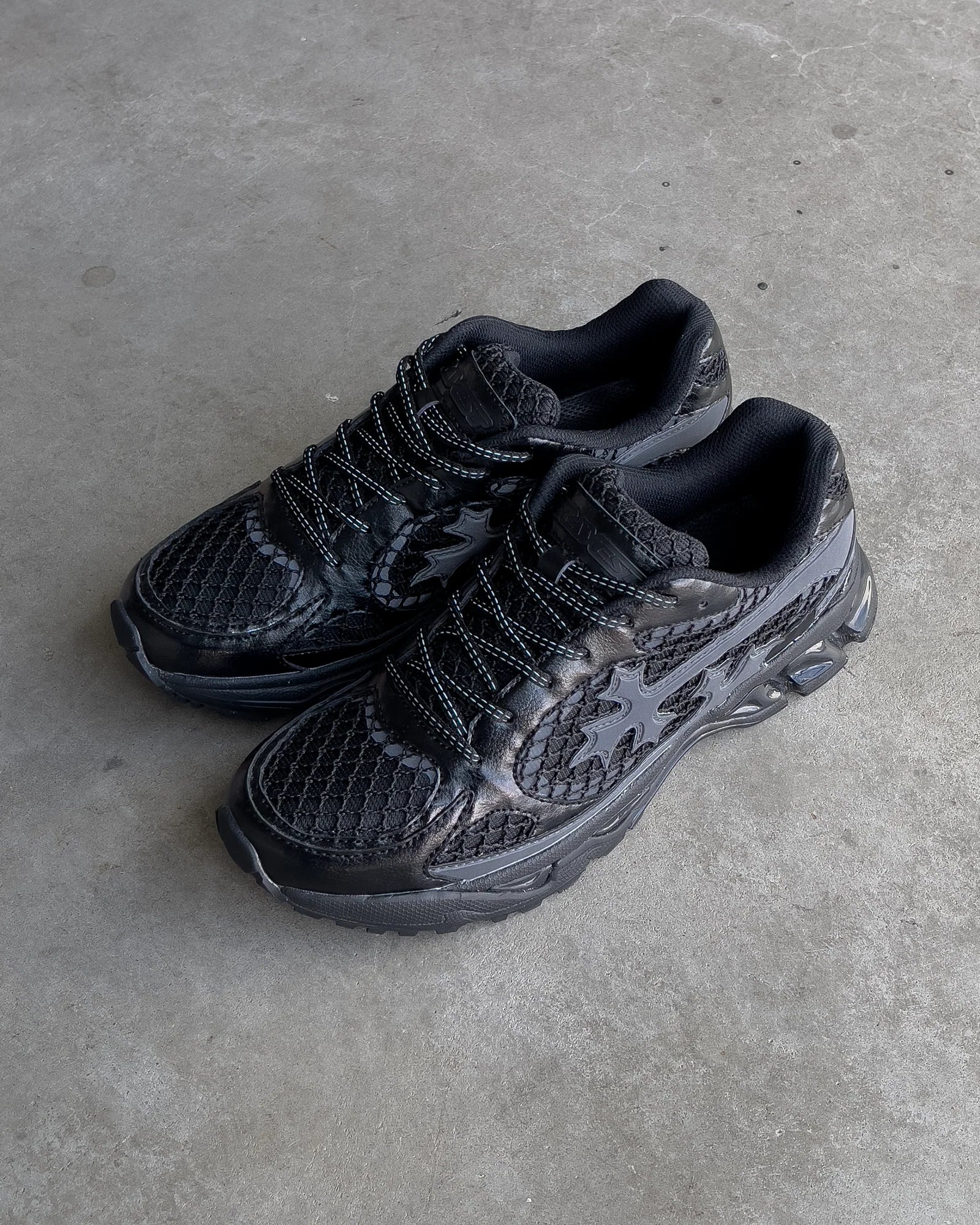 Bravest Studios “Triple Black Kross Kountry Runner"
