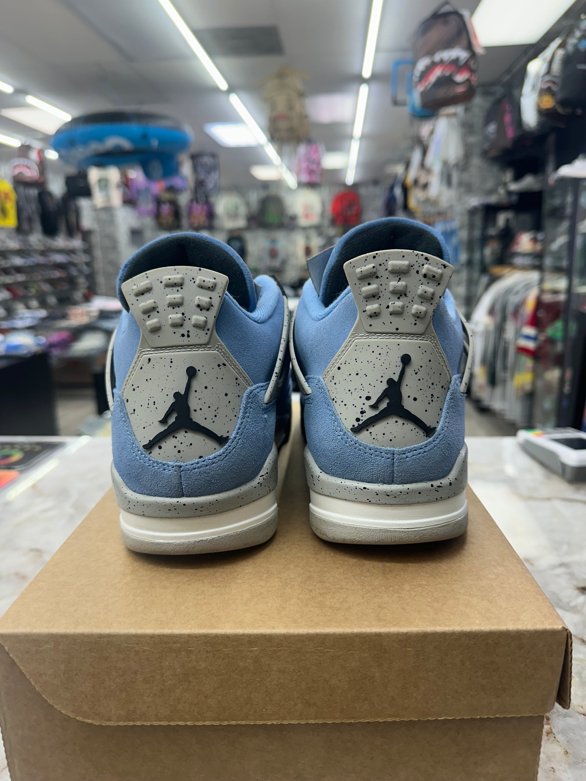 Air Jordan Retro 4 "University Blue" *Size 9 Preowned* (CT8527-400)