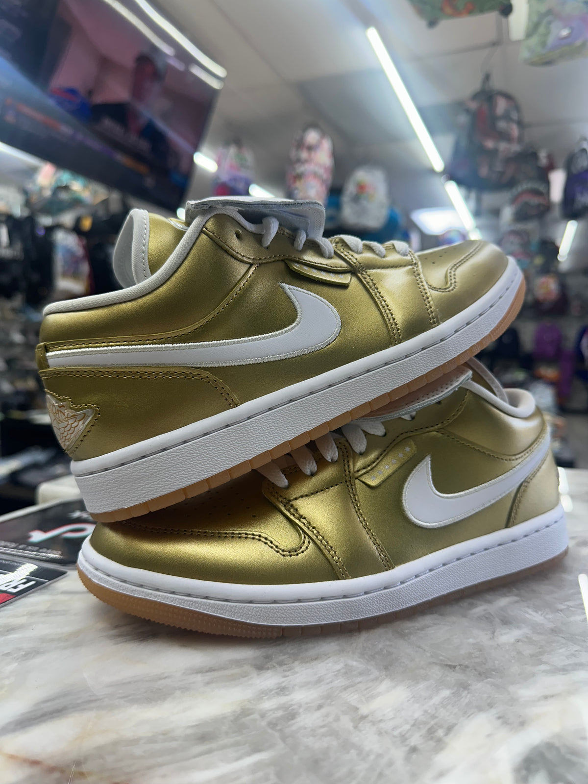 Air Jordan 1 Low "Gold Tiempo (Women's)" IR2304-703