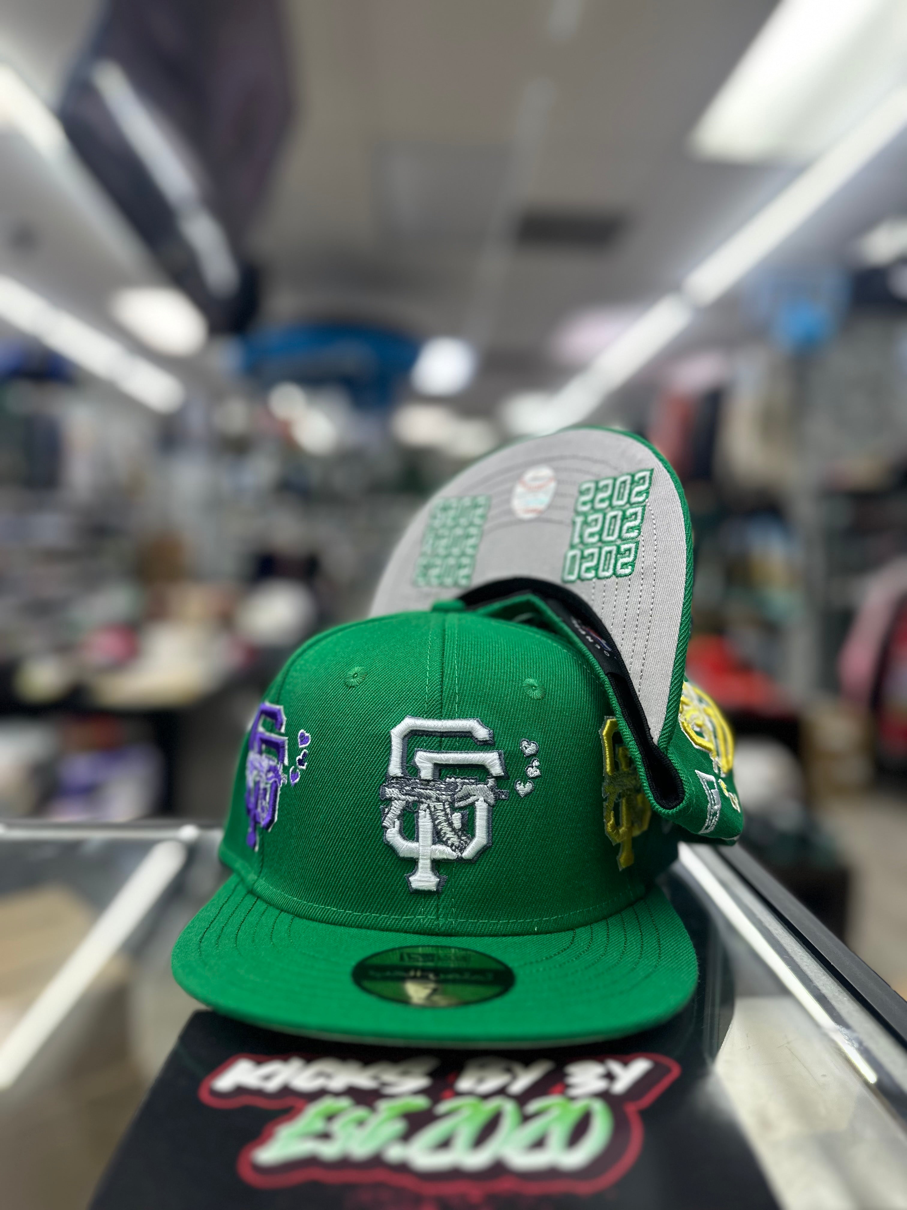 Love Sucks Multi Logo Fitted "MARDI GRAS" (GREEN)
